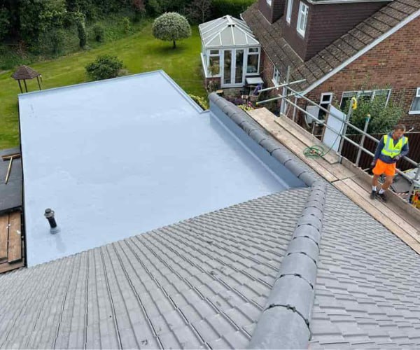 This is a photo of a newly installed hip roof, with a combined liquid covered flat roof. Work carried out by DSC Roofing Rushden